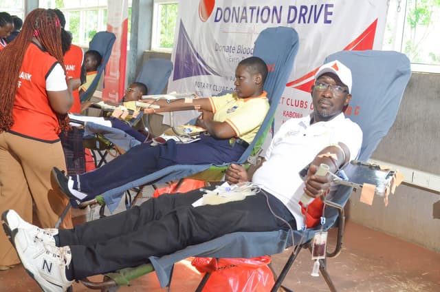 Volunteers donating blood at the Rotary blood donation drive